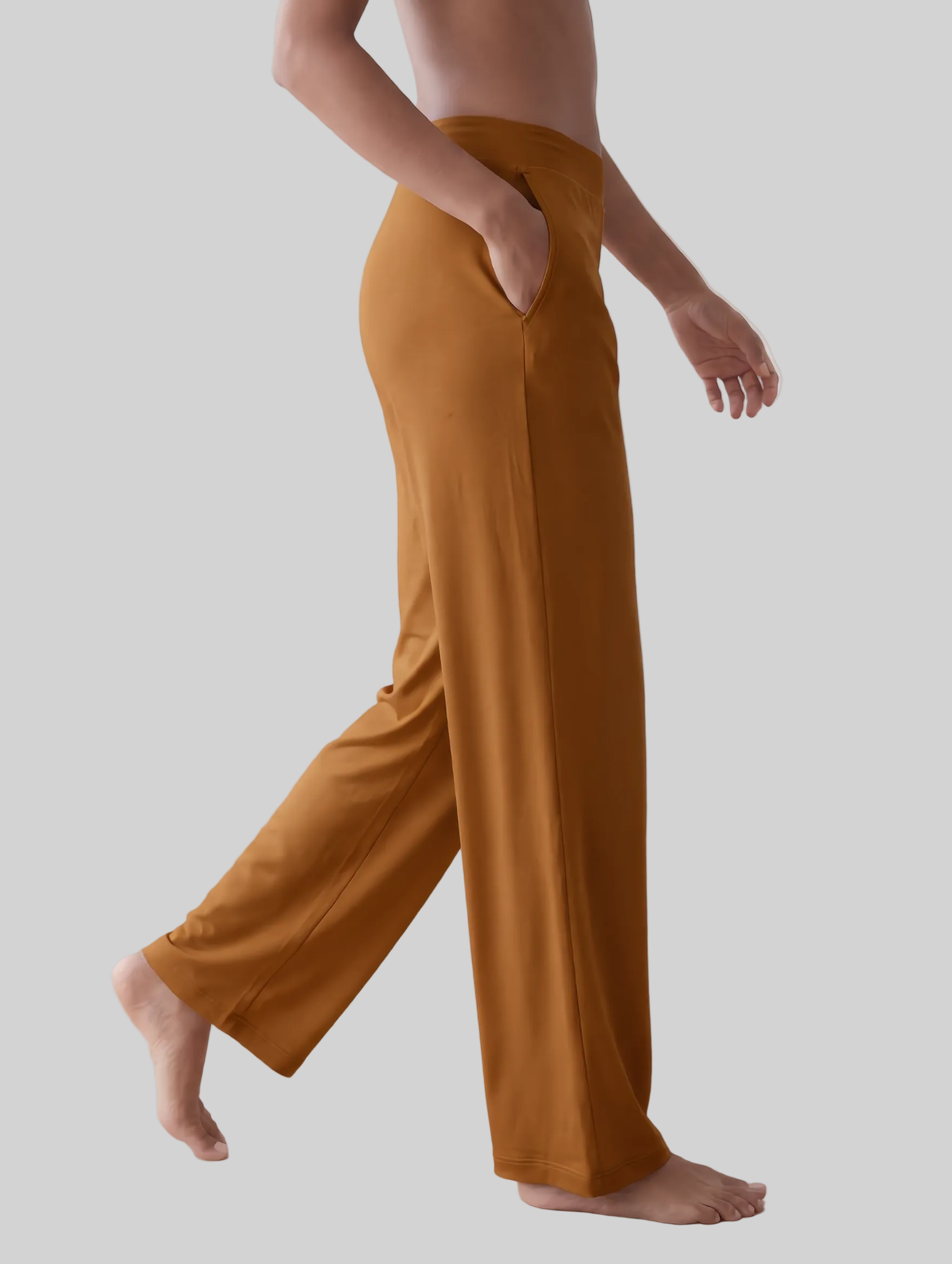 A person wearing wide-leg, high-waisted trousers 