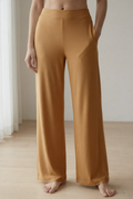 Woman wearing caramel bamboo wide-leg trousers loungewear 