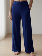 Woman wearing caramel bamboo wide-leg trousers loungewear 