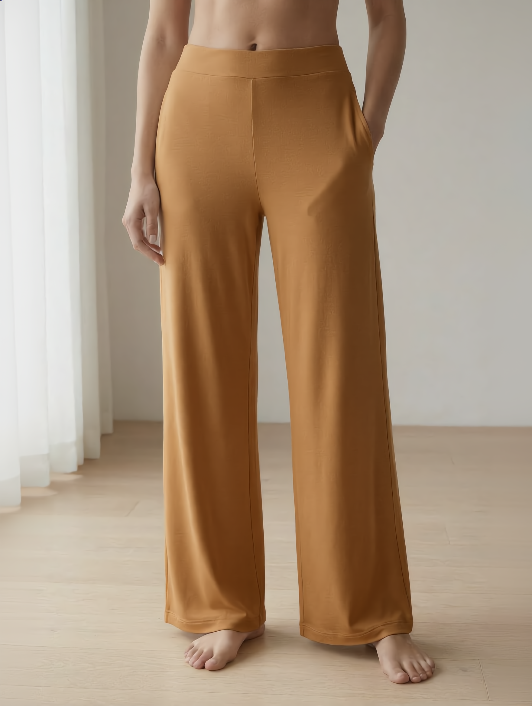 Woman wearing caramel bamboo wide-leg trousers loungewear 