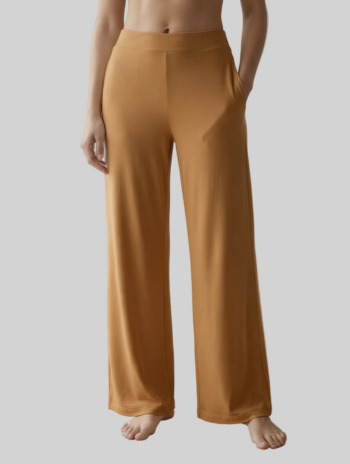 Woman wearing caramel bamboo wide-leg trousers loungewear 
